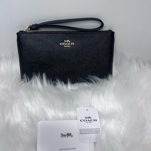 Coach large leather wristlet, Black with gold details. NWT
